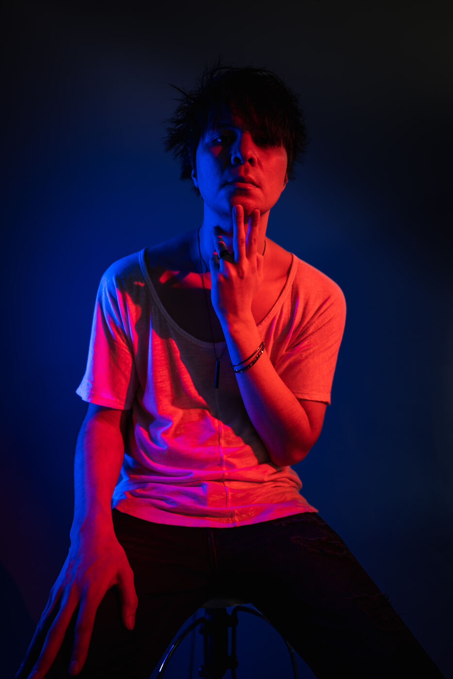 Studio portrait in red and blue gels